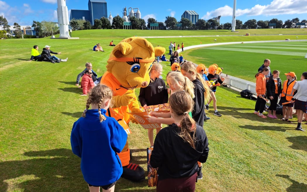The Dutch squad's mascot, an orange lion who goes by Kicky, spent the day signing team merchandise and posing for photos with fans on 19 July, 2023.