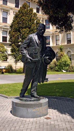 Statue of Peter Fraser, whichstands outside the former Government Buildings in Wellington.