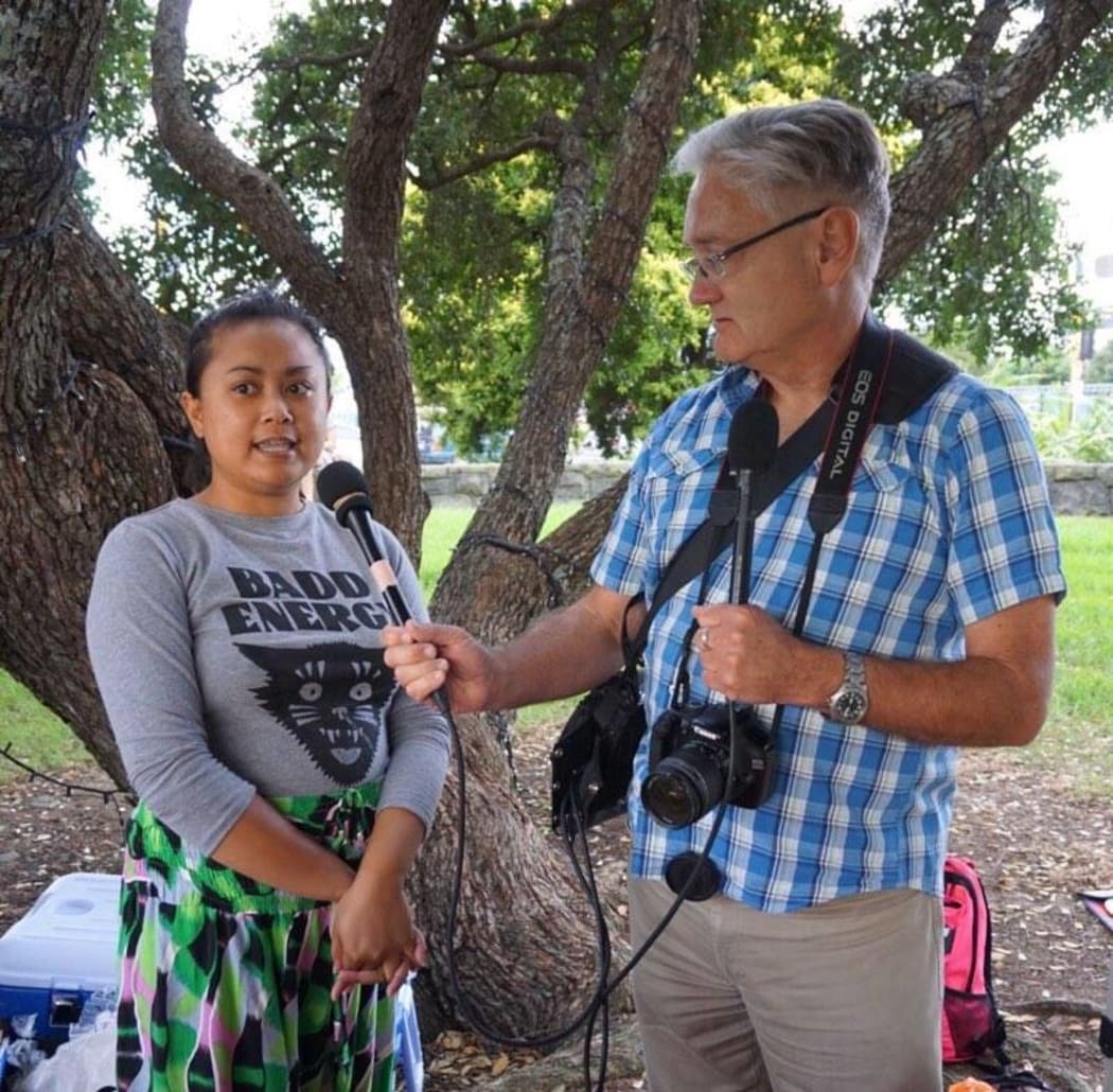 An image of David Steemson interviewing a young woman.