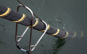 ERDF (Electricity Network Distribution France) and Louis Dreyfus company install an electric submarine cable and optical fiber between Quiberon and Belle-Ile-en-mer, western France, in 2015.