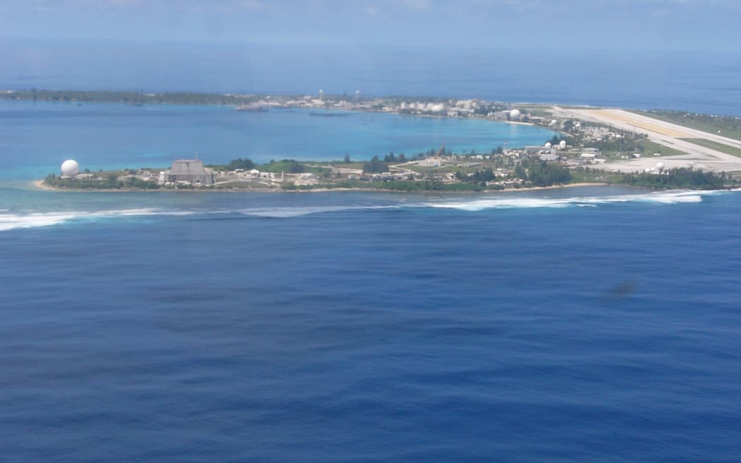 Kwajalein aerial landing. Workers from Roi-Namur Island in the northern side of Kwajalein Atoll were evacuated Saturday to the base headquarters, pictured, after high waves flooded much of Roi-Namur, causing significant damage