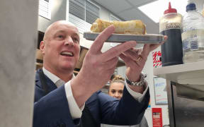 Christopher Luxon has made a cheese roll at Majestic Tea Bar in Invercargill while on the campaign trail on 21 September 2023.
