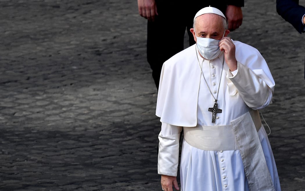 Pope Francis arrives to hold the weekly general audience, at San Damaso courtyard in The Vatican, on June 30, 2021.