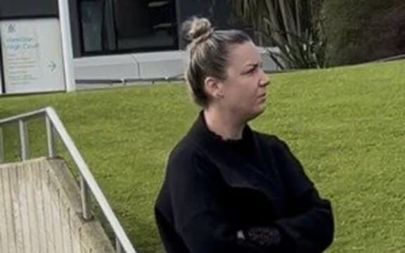 Holly Pattison, 36, leaves the Hamilton District Court on Wednesday after being sentenced to home detention for crashing her car and injuring two others while over the legal blood alcohol limit.