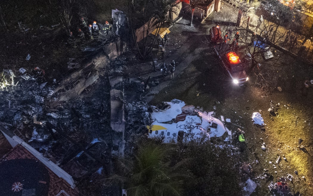 Aerial view of the wreckage of an airplane that crashed with 61 people on board in Vinhedo, Sao Paulo State, Brazil, on 9 August 2024.