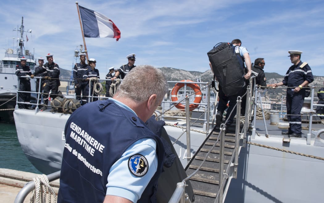 French marines embark on the EV Jacoubet patroller to take part in a search operation of the missing EgyptAir plane.