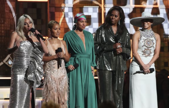 Lady Gaga, from left, Jada Pinkett Smith, Alicia Keys, Michelle Obama and Jennifer Lopez speak at the 61st annual Grammy Awards on Sunday, Feb. 10, 2019, in Los Angeles.