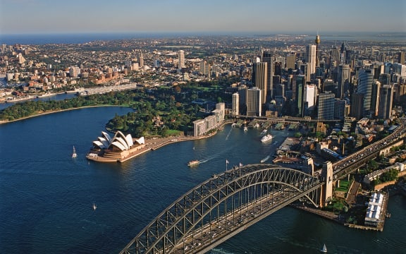 Australia, Sydney, Aerial view of city and bay (Photo by Paul Campbell / Image Source / Image Source via AFP)