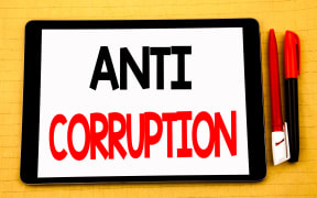 Conceptual handwriting text caption inspiration showing Anti Corruption. Business concept for Bribery Corrupt Text Written on tablet, wooden background with sticky note and pen