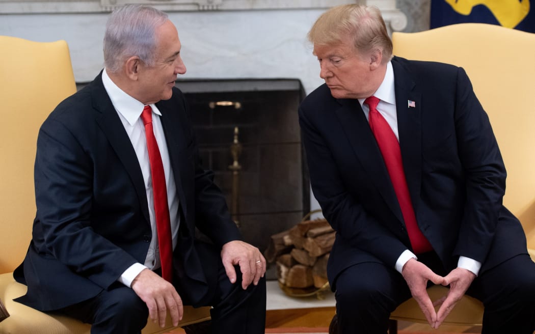 Israeli Prime Minister Benjamin Netanyahu and US President Donald Trump in the Oval Office at the White House in Washington, DC, March 25, 2019.