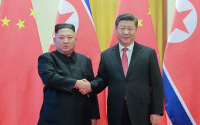 North Korea's leader Kim Jong Un (left) shaking hands with China's President Xi Jinping during a welcome ceremony at the Great Hall of the People in Beijing in January, 2019.