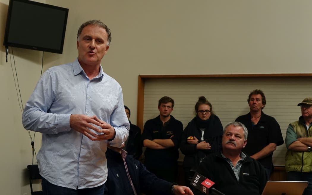 Geoff Gwyn speaks at the meeting.