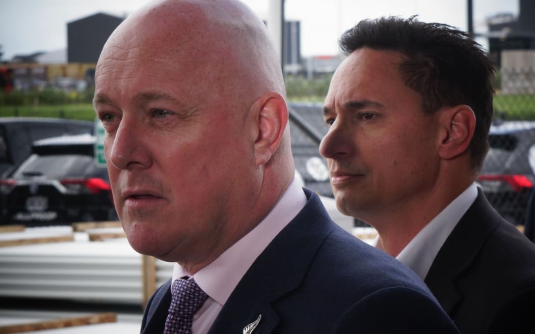 Prime Minister Christopher Luxon, joined by MP Dan Bidois, addresses speculation that his position as leader is under threat.