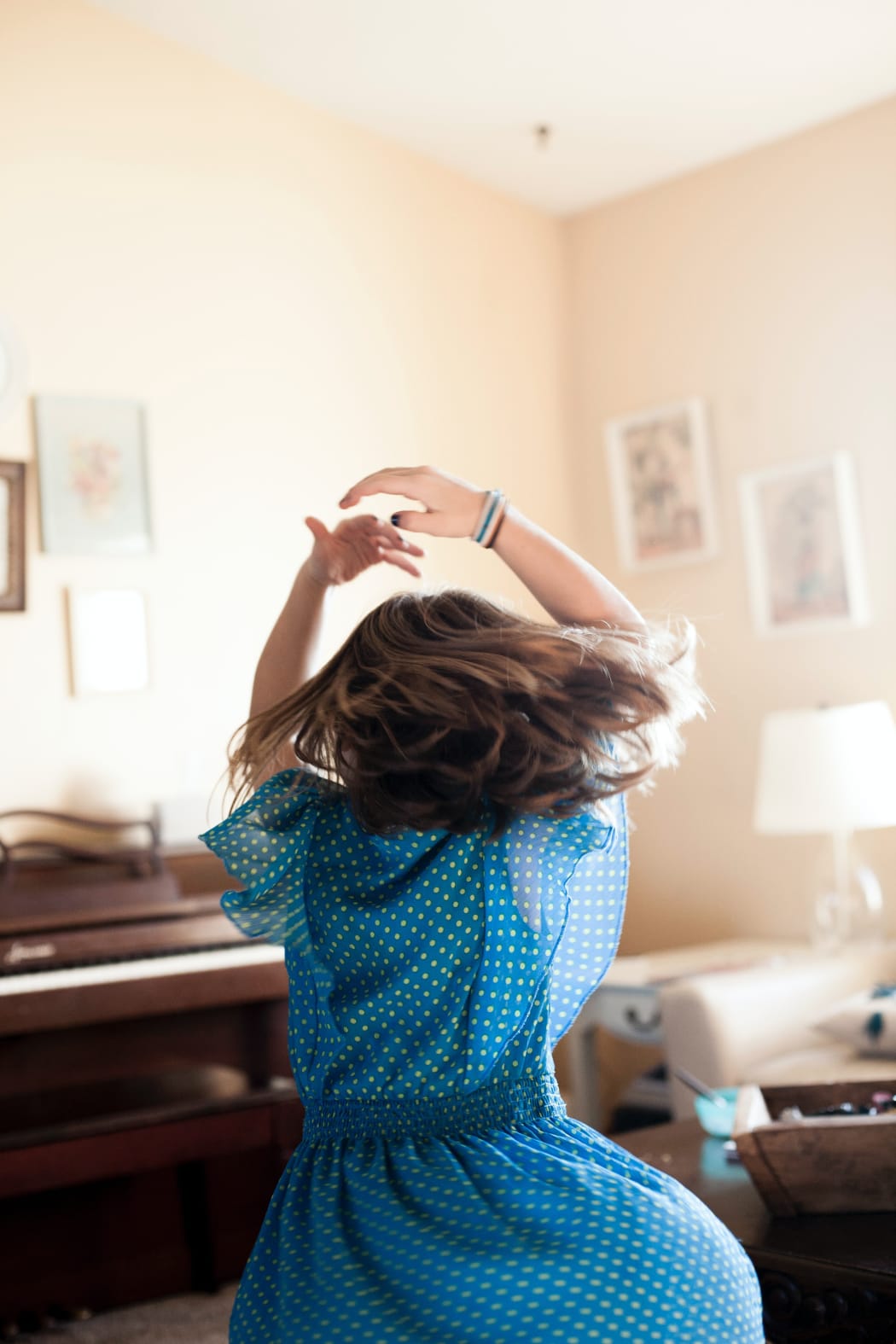 girl dancing in blue dress