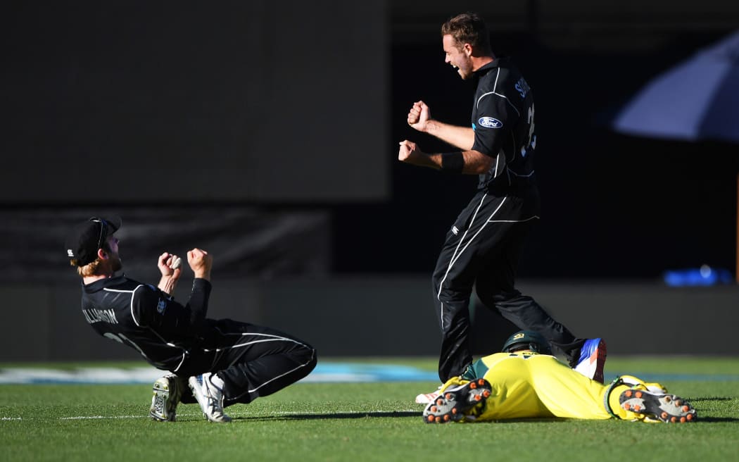 Kane Williamson and Tim Southee celebrate the running out of Josh Hazlewood.
