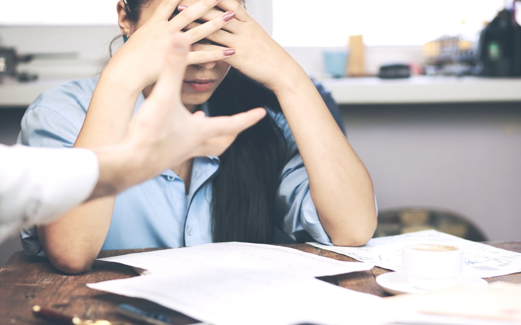 Boss threatening with finger his employee, isolated