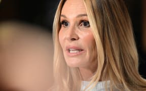 27 February 2024, Bavaria, Munich: Elle Macpherson, model and actress, stands on the white carpet at the gala for the Best Brands Awards 2024, Hotel "Bayerischer Hof". Photo: Felix Hörhager/dpa (Photo by Felix Hörhager / DPA / dpa Picture-Alliance via AFP)