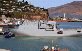 The HMNZS Canterbury arriving at the Port of Lyttelton with emergency supplies on 28 February 2011.