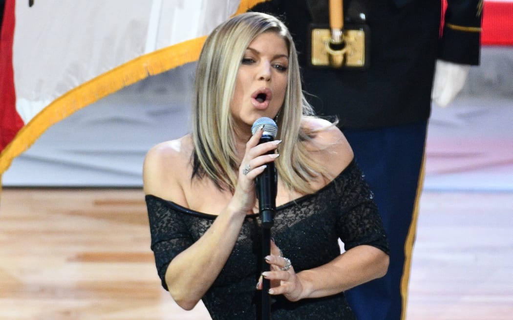 Singer Fergie sings the national anthem prior to The 67th NBA All-Star Game.