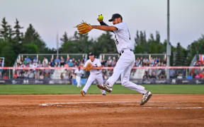 New Zealand Black Sox pitcher, Pita Rona, son of Brad Rona - a four-time Black Sox world champion - pitched the side to its first victory at the WBSC Softball World Cup Finals against Canada.