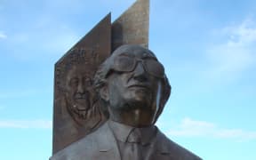 Bust of the Spanish composer Joaquín Rodrigo, with an image of his wife, the pianist Victoria Kamhi, in the background. España Park, Rosario, Santa Fe Province, Argentina