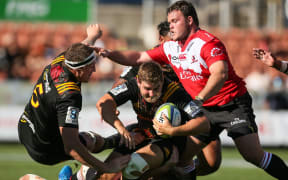 Brodie Retallick and Rhys Marshall of the Chiefs playing against the Lions.