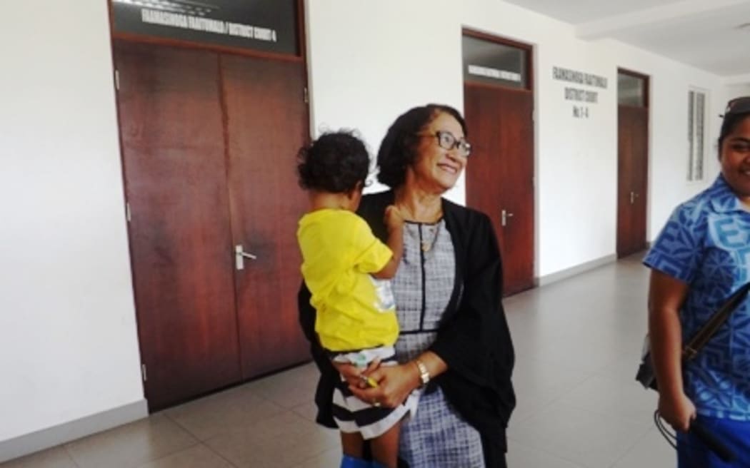 Leulua'ialii Olinda and the 3 year old child.