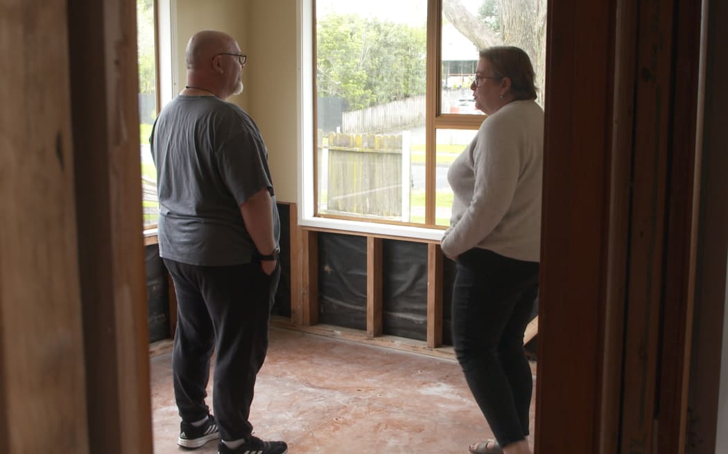 Dave and Keri Skelling, in their Ranui house, which flooded on Auckland Anniversary weekend.