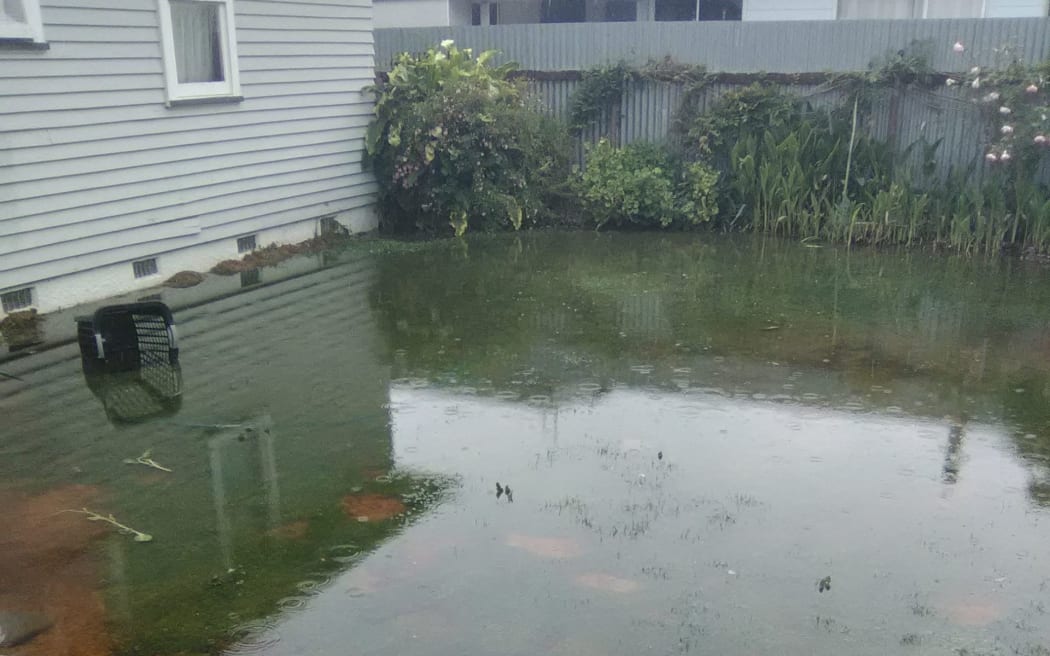 File photo. Wastewater overflows at a Cockburn St property in 2018. The issue has been ongoing for many years.