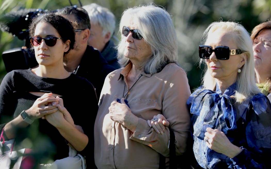 Carole Whorrall (centre) attends a service in memory of murdered son Kyle at St John's Reserve, Meadowbank.