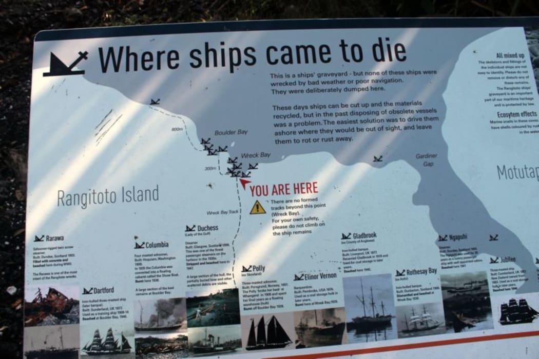 This is  a  picture of  a sign at Boulder Bay on Rangitoto Island  which displays the sites of all the  wrecked ships there.