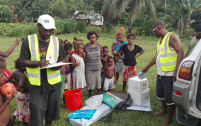 Villagers in Solomon Islands receive relief after a 7.8 magnitude earthquake struck on 9 December 2016