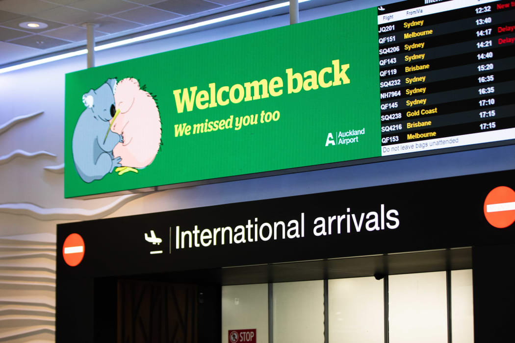 Auckland Airport welcome back sign.