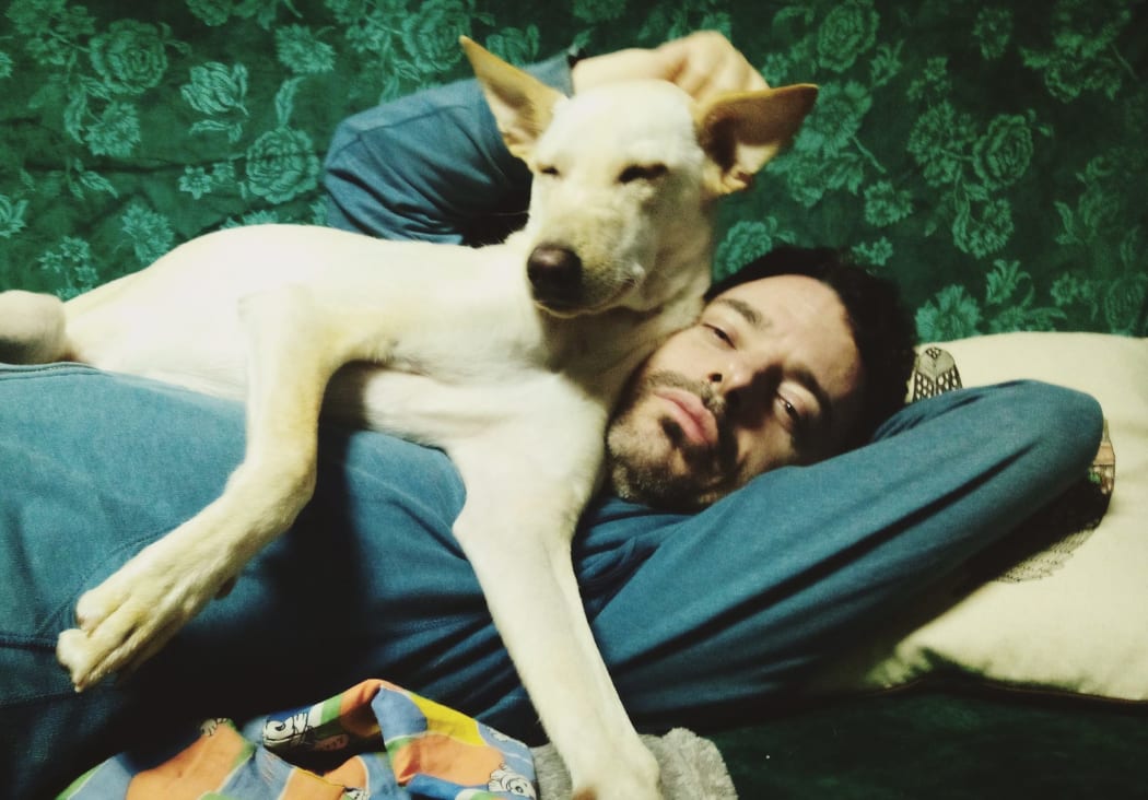 Ron Hanson with his dog Dou Dou in Taiwan