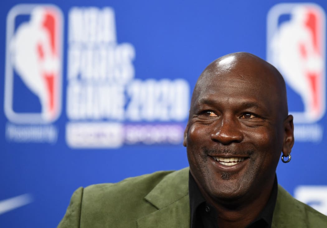 A pair of sneakers worn by NBA superstar Michael Jordan early in his career sold for nearly $1.5 million on October 24, 2021, setting a record price at auction for game-worn footwear, Sotheby's said.