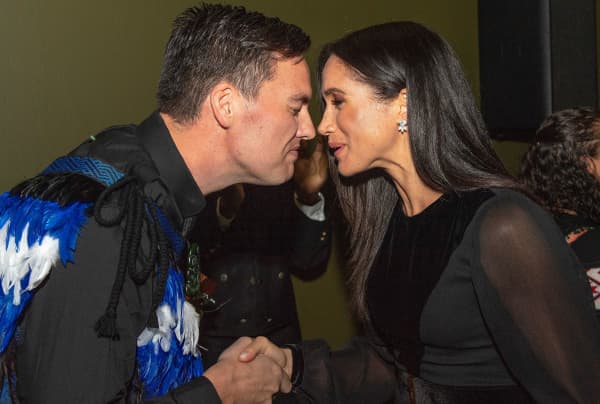 Meghan, Duchess of Sussex is welcomed to the opening of the  'Oceania' exhibition at the Royal Academy of Arts in London with a hongi.