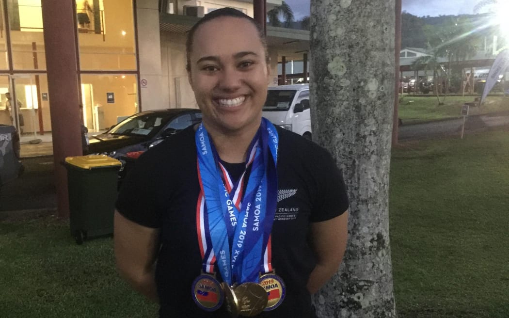 Weightlifter Kanah Andrews-Nahu has won New Zealand's first gold medals of the Pacific Games in Samoa.