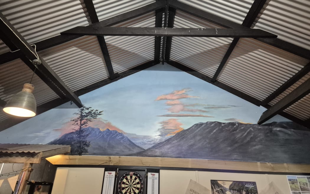 A mural of the Tararua Ranges which the farm sits under.