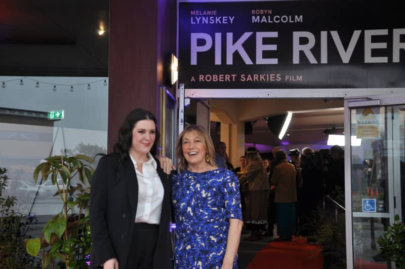 Melanie Lynskey and Robyn Malcolm outside Greymouth's Regent Theatre for the Pike River film premiere.