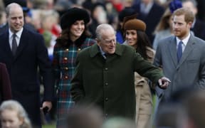 Prince Philip pictured with Prince William, Kate Middleton, Prince Harry and Meghan Markle at the Royal Family's traditional Christmas Day church service at St Mary Magdalene Church in Sandringham, Norfolk, eastern England, on December 25, 2017.