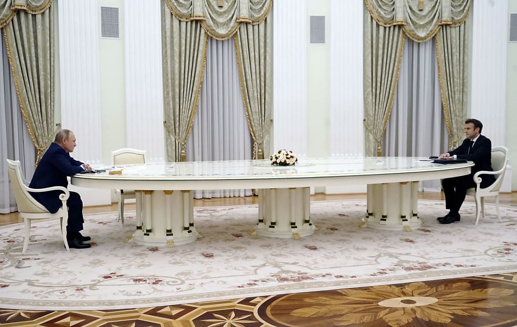 French President Emmanuel Macron (right) meets with Russian President Vladimir Putin in Moscow on February 7, 2022, for talks in an effort to find common ground on Ukraine and NATO.
