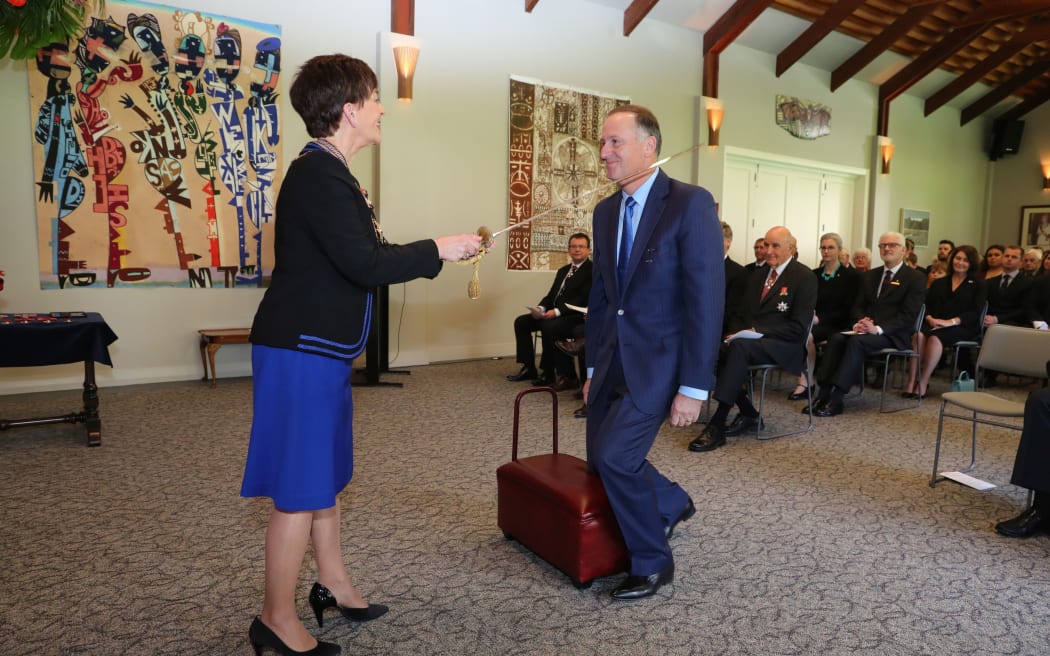 Sir John Key is knighted by Dame Patsy Reddy.