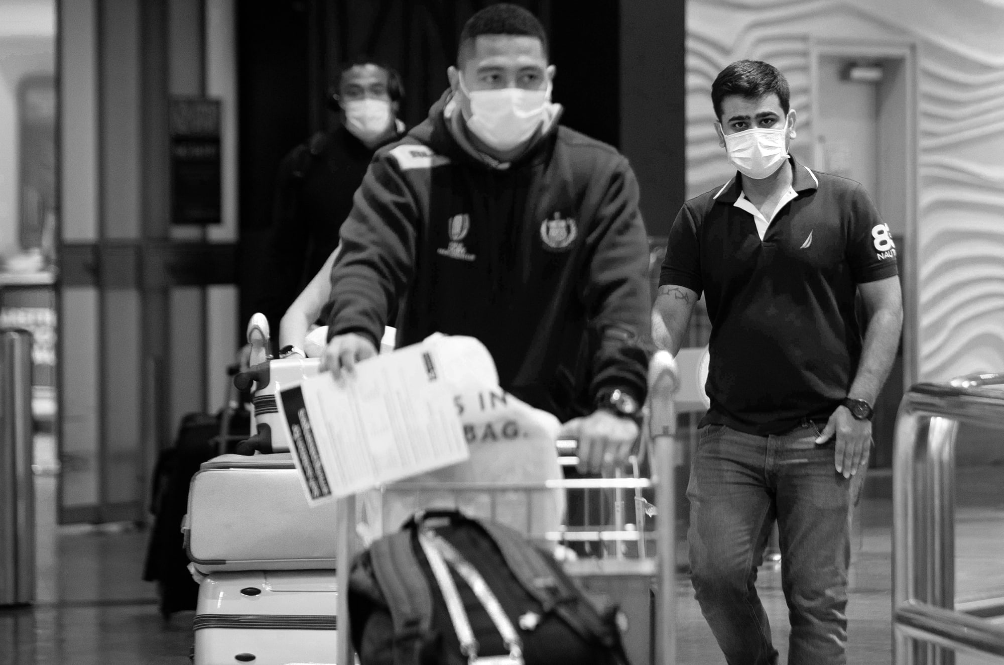 Travellers arrive at Auckland Airport amidst the Covid-19 pandemic