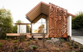 A house called a swamp dwelling in Christchurch's Opawa has won an architectural award for its sophisticated and unassuming beauty.