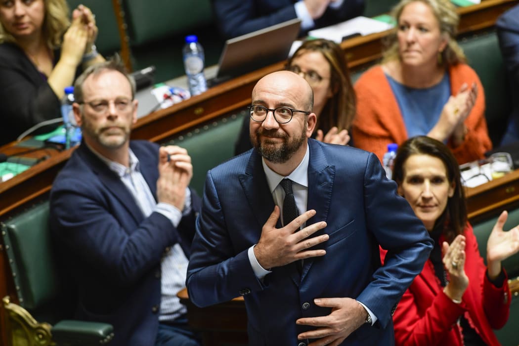 Belgian Prime Minister Charles Michel gestures after delivering a "Solemn and Memorial Declaration of the Federal Government".
