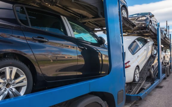 Some cnew cars in a car transport. Truck car carrier