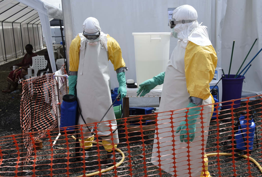 Health workers at an  Ebola treatment centre in Monrovia, Liberia.