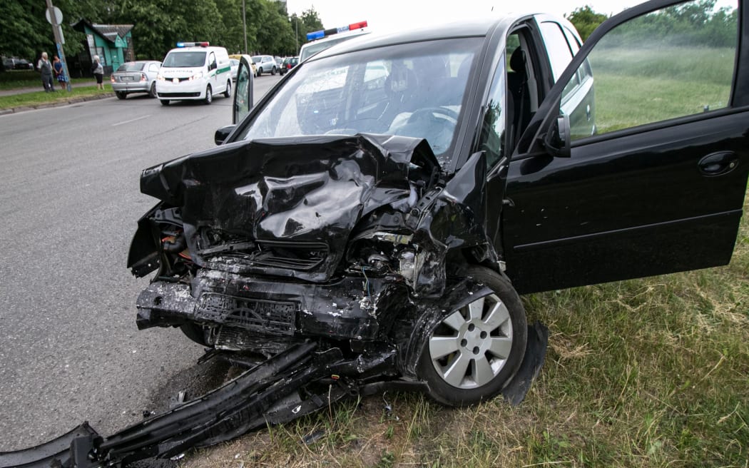 Auto accident. Crashed car in the street. Damaged car after collision