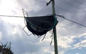 A trampoline caught in powerlines in Gisborne.