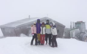 Students from Wellington High are snowed in on Mount Ruapehu's Tukino ski field.